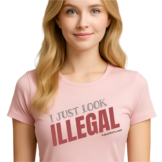 Person wearing a pink t-shirt with 'I JUST LOOK ILLEGAL' . Free Shipping. Unisex.