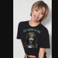 The Throw Up Girl T-shirt worn by model sticking out her tongue on video.